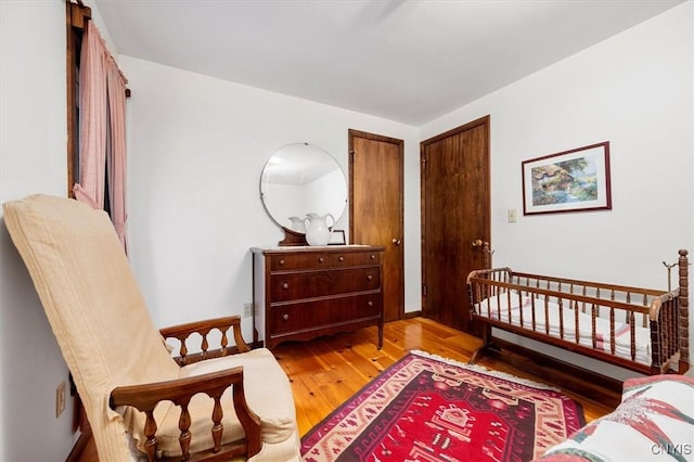 175 S Rondaxe Rd, Webb, NY 13420 - bedroom featuring wood finished floors