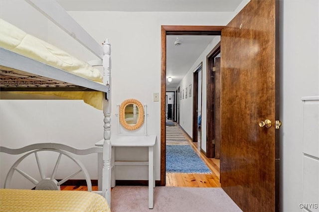 175 S Rondaxe Rd, Webb, NY 13420 - bedroom featuring wood finished floors