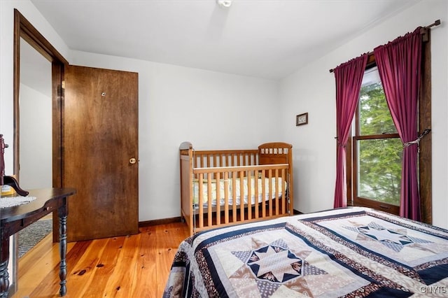 175 S Rondaxe Rd, Webb, NY 13420 - bedroom with hardwood / wood-style floors