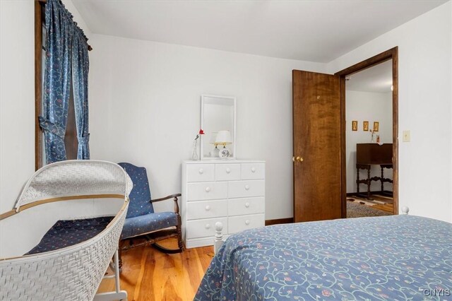 175 S Rondaxe Rd, Webb, NY 13420 - bedroom with wood finished floors