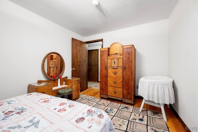 175 S Rondaxe Rd, Webb, NY 13420 - bedroom with light wood-style flooring