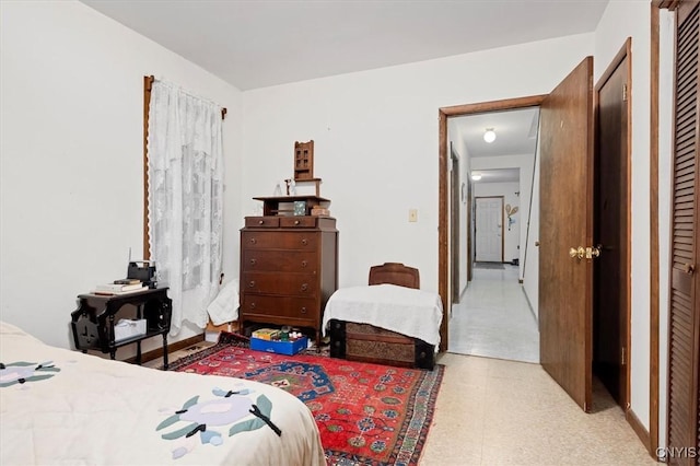 175 S Rondaxe Rd, Webb, NY 13420 - bedroom with tile patterned floors and a closet