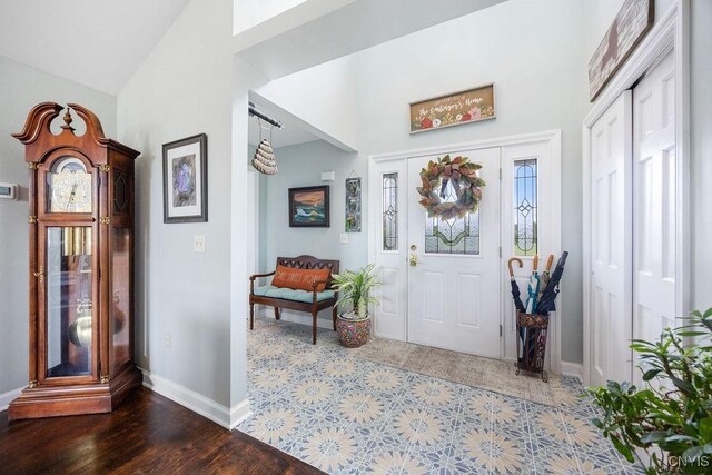 5479 Lake Rd, Tully, NY 13159 - entryway with baseboards and high vaulted ceiling