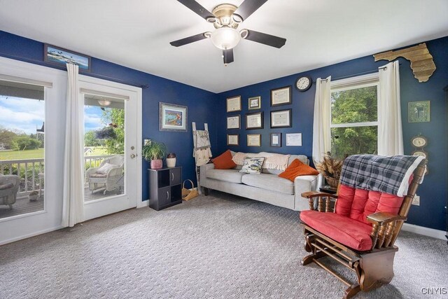 5479 Lake Rd, Tully, NY 13159 - living area with carpet floors and a ceiling fan
