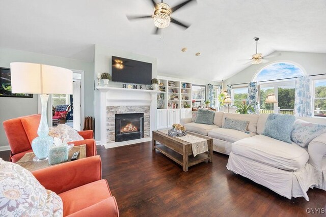 5479 Lake Rd, Tully, NY 13159 - living room with a ceiling fan, vaulted ceiling, wood finished floors, and a fireplace