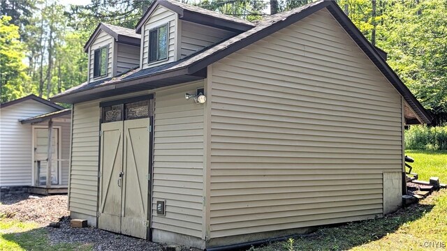 6234 Reservoir Rd, Lebanon, NY 13346 - view of side of home featuring roof with shingles