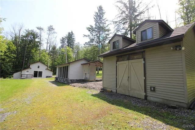 6234 Reservoir Rd, Lebanon, NY 13346 - view of grassy yard with a storage shed and view of wooded area