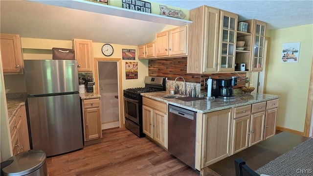 6234 Reservoir Rd, Lebanon, NY 13346 - kitchen with stainless steel appliances, dark wood-style flooring, decorative backsplash, glass insert cabinets, and light brown cabinets