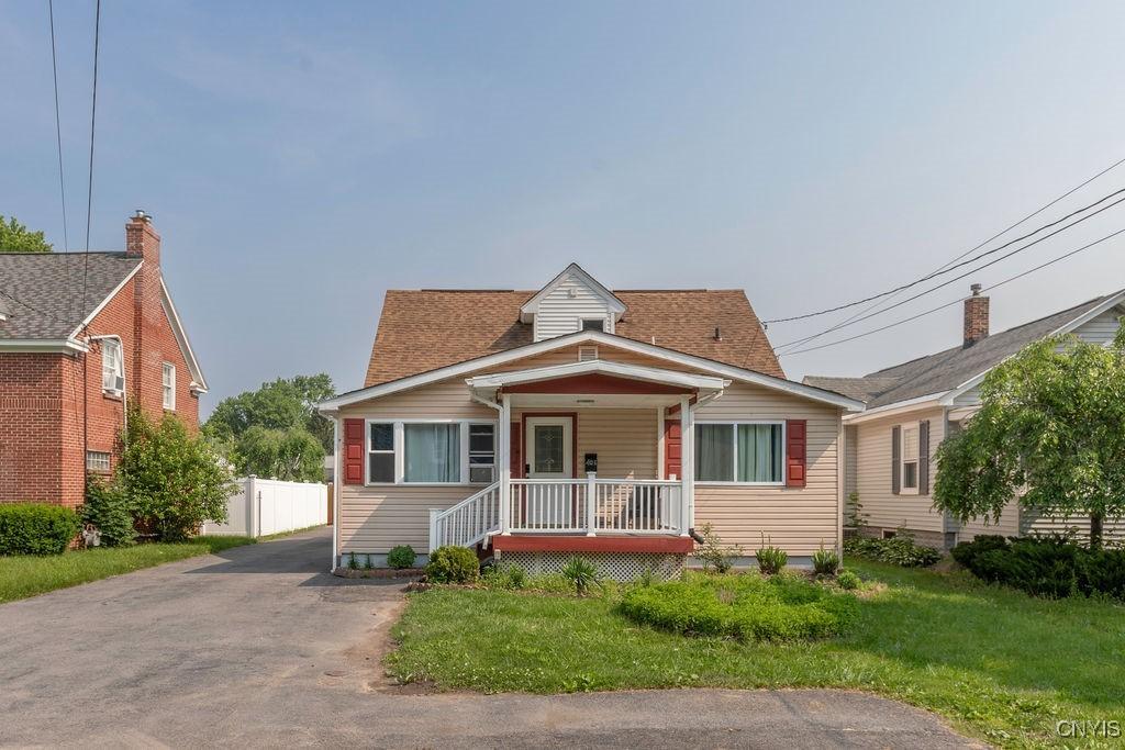 405 E Molloy Rd, Salina, NY 13211 - bungalow-style home featuring a porch and a shingled roof