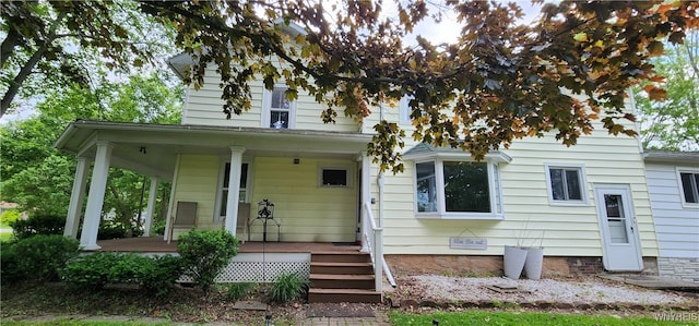 7029 Akron Rd, Lockport Town, NY 14094 - view of front of property with a porch
