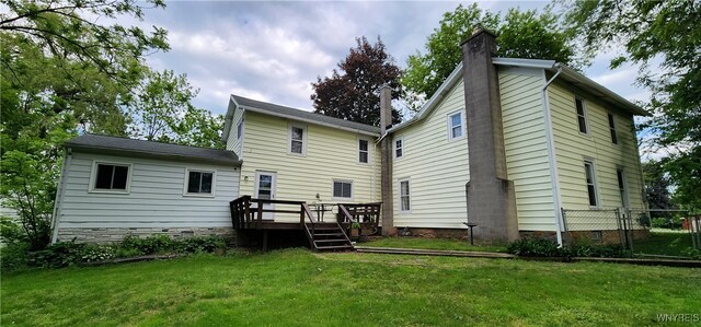 7029 Akron Rd, Lockport Town, NY 14094 - back of house featuring a deck, a chimney, and crawl space