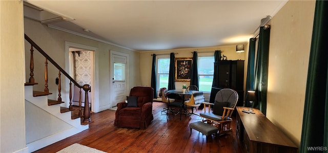 7029 Akron Rd, Lockport Town, NY 14094 - living area with wood-type flooring, stairs, a baseboard radiator, and crown molding