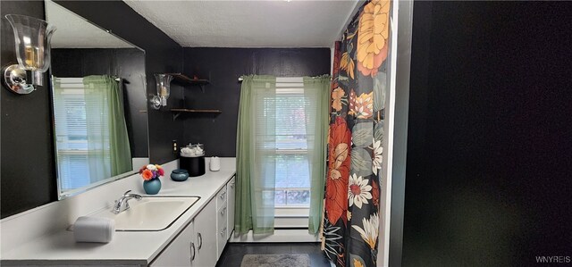 7029 Akron Rd, Lockport Town, NY 14094 - bathroom featuring vanity and tile patterned flooring