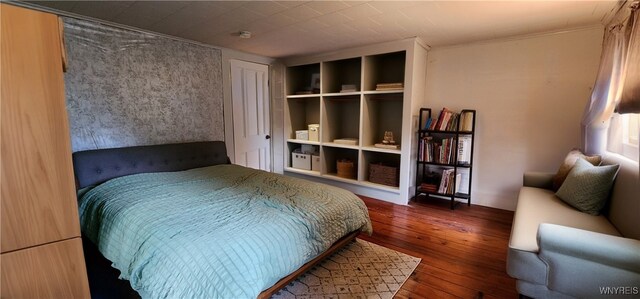 7029 Akron Rd, Lockport Town, NY 14094 - bedroom featuring hardwood / wood-style floors and a closet