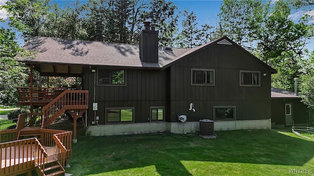 17 Quail, Orchard Park, NY 14127 - rear view of property with stairs, a deck, a yard, a chimney, and a shingled roof