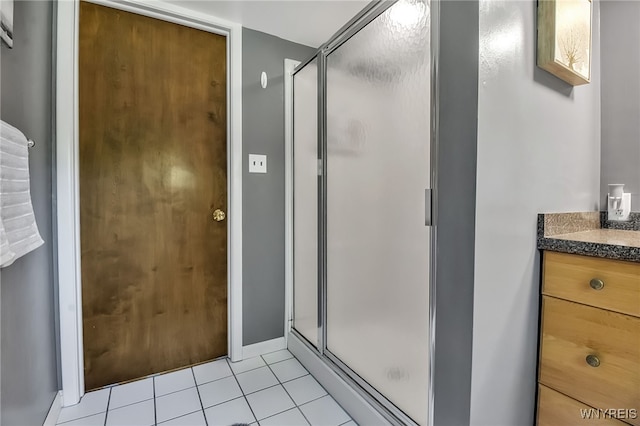 17 Quail, Orchard Park, NY 14127 - full bathroom featuring a stall shower, tile patterned floors, and vanity