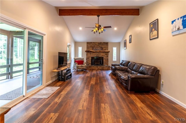 217 Sloperville Rd, Albion, NY 13302 - living room with a stone fireplace, ceiling fan, and dark wood-type flooring