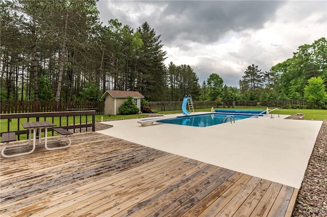 217 Sloperville Rd, Albion, NY 13302 - view of pool featuring a water slide, a fenced backyard, a deck, and a patio