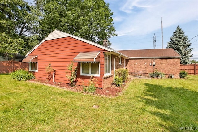 664 Upper Mountain Rd, Lewiston, NY 14092 - view of property exterior with brick siding and a chimney