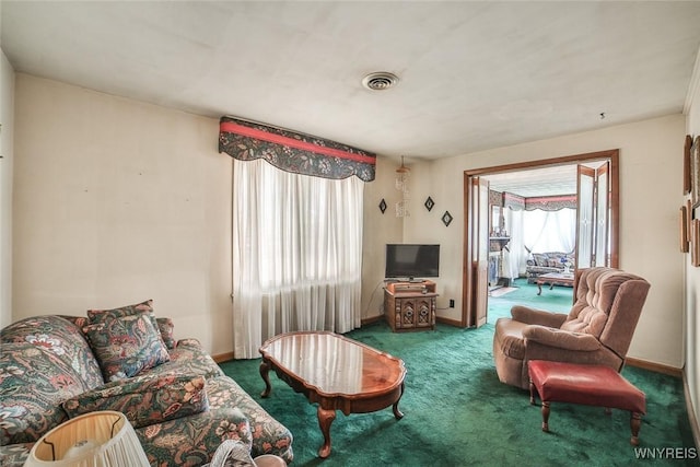 664 Upper Mountain Rd, Lewiston, NY 14092 - living area with carpet floors and baseboards