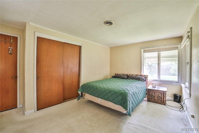 664 Upper Mountain Rd, Lewiston, NY 14092 - carpeted bedroom featuring a closet and ornamental molding