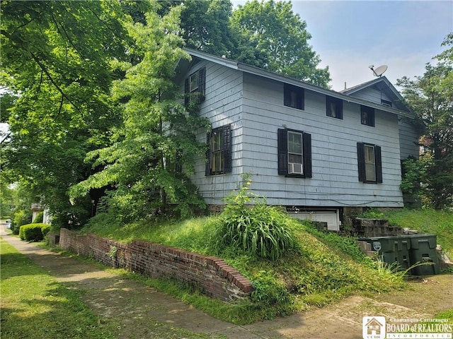 315 E 6th St, Jamestown, NY 14701 - view of home's exterior featuring an attached garage