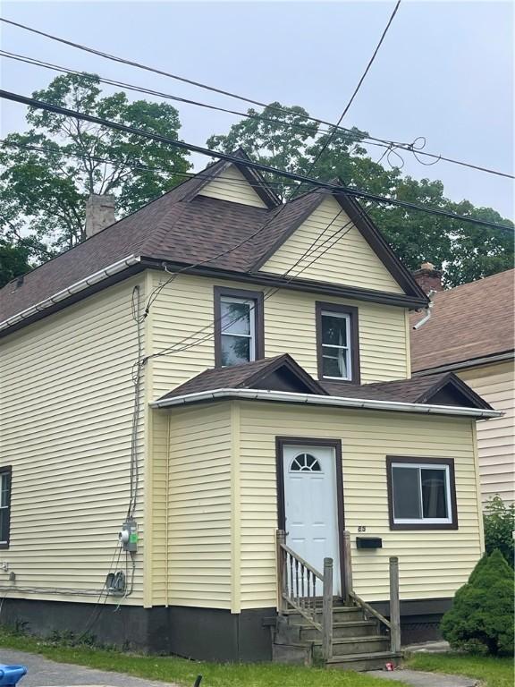 85 Eiffel Pl, Rochester, NY 14621 - view of front of property with entry steps and roof with shingles
