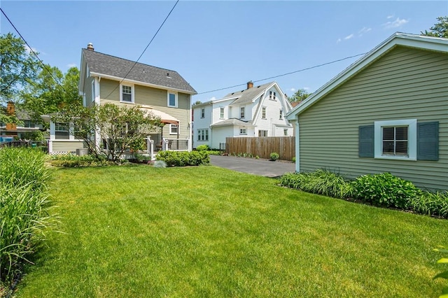 207 Wimbledon Rd, Irondequoit, NY 14617 - back of property with a chimney