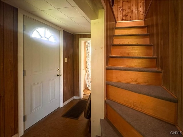 9067 Main St, Brookfield, NY 13418 - foyer with stairs and wooden walls