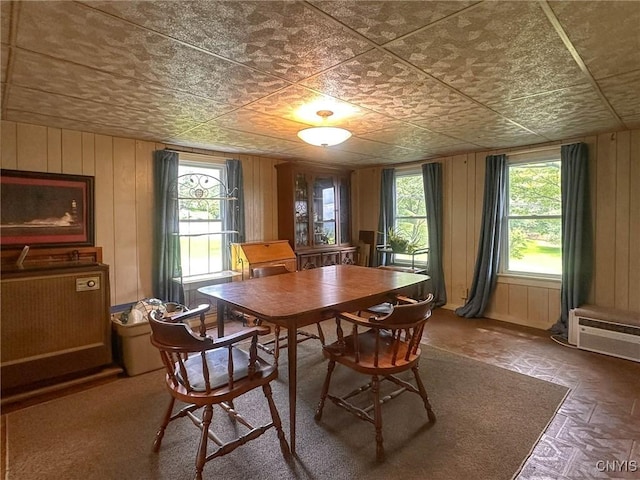 9067 Main St, Brookfield, NY 13418 - dining room featuring wooden walls