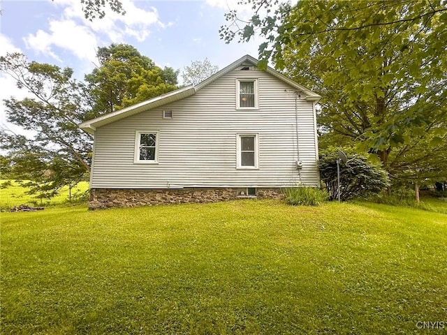9067 Main St, Brookfield, NY 13418 - view of home's exterior with a lawn