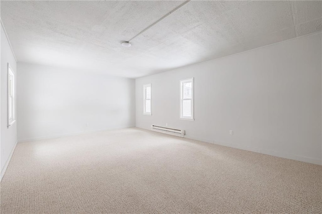 123 Rauber St, Rochester, NY 14605 - empty room featuring a baseboard radiator, carpet floors, and a textured ceiling
