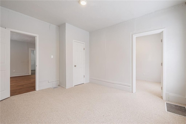 123 Rauber St, Rochester, NY 14605 - unfurnished bedroom with carpet flooring and baseboards