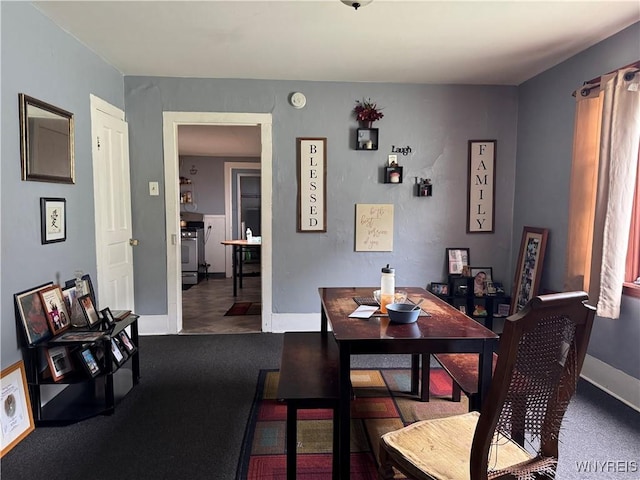 139 Weimar St, Buffalo, NY 14206 - carpeted dining space featuring baseboards