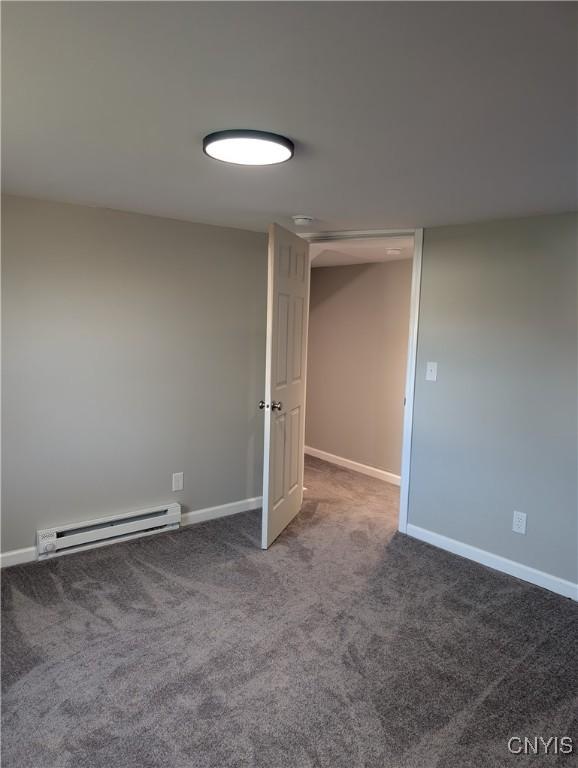 145 Creamery Rd Unit B, Scriba, NY 13126 - carpeted empty room with a baseboard radiator and baseboards