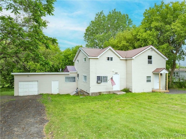 145 Creamery Rd Unit B, Scriba, NY 13126 - view of front facade featuring a garage, driveway, a front yard, and a metal roof