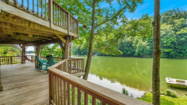 8567 Glen Rd, Rushford, NY 14777 - wooden terrace with a water view