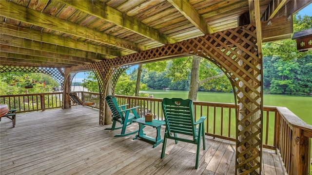 8567 Glen Rd, Rushford, NY 14777 - wooden terrace featuring view of wooded area and a water view