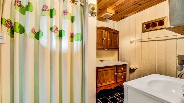 8567 Glen Rd, Rushford, NY 14777 - bathroom with wood ceiling, vanity, tile patterned floors, and a shower with shower curtain