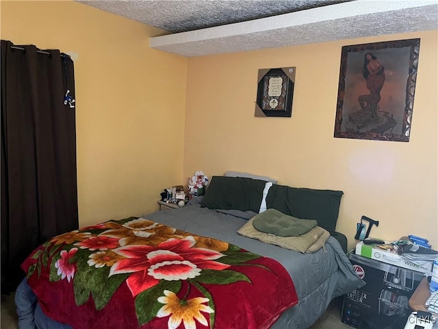 711 Stevens St, Utica, NY 13502 - bedroom featuring a textured ceiling
