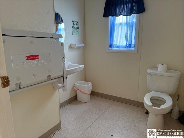 540 W Creek Rd, Owego, NY 13827 - bathroom featuring toilet and baseboards
