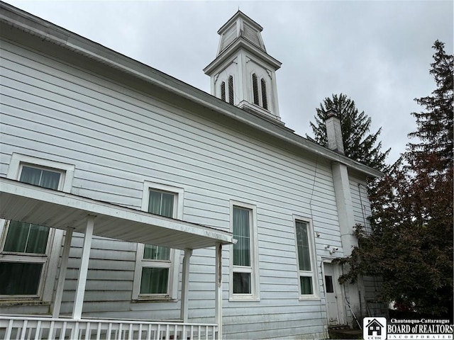 540 W Creek Rd, Owego, NY 13827 - view of side of property with a chimney