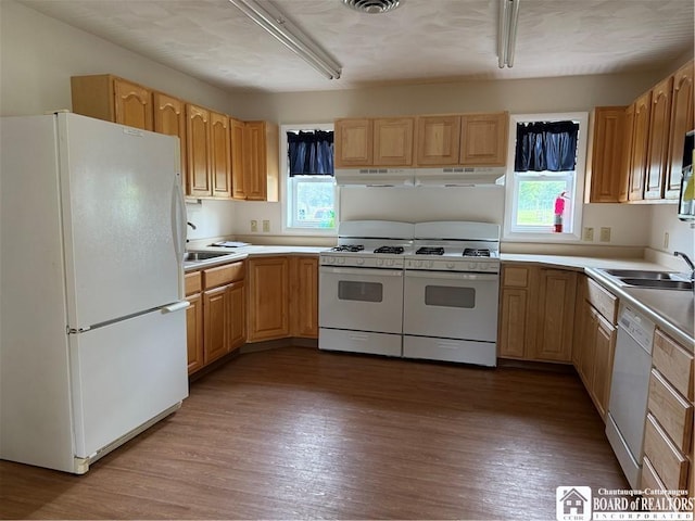 540 W Creek Rd, Owego, NY 13827 - kitchen with white appliances, wood finished floors, light brown cabinets, and light countertops