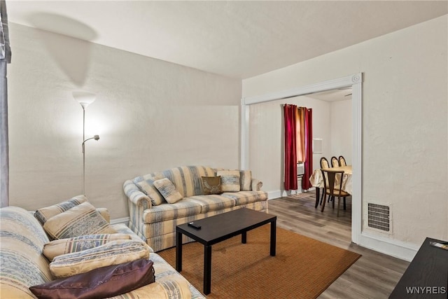 1812 18th St, Niagara Falls, NY 14305 - living room featuring wood finished floors and baseboards