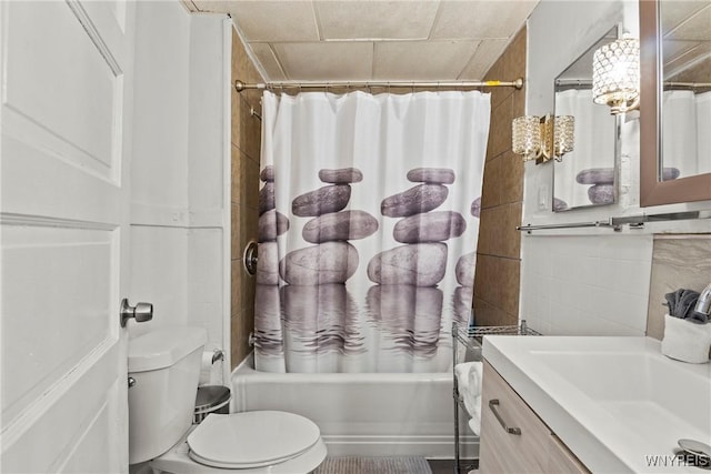 1812 18th St, Niagara Falls, NY 14305 - bathroom with vanity, shower / bath combination with curtain, and tile walls