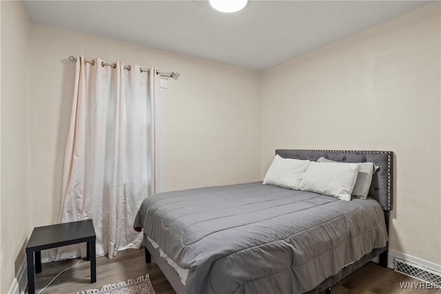 1812 18th St, Niagara Falls, NY 14305 - bedroom featuring wood finished floors and baseboards