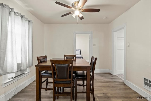 1812 18th St, Niagara Falls, NY 14305 - dining area with a ceiling fan and wood finished floors