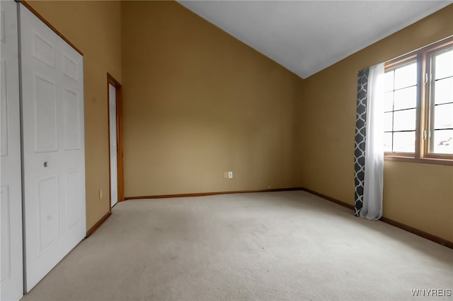 5 Keph Dr Unit 8, Amherst, NY 14228 - unfurnished bedroom with light carpet and vaulted ceiling
