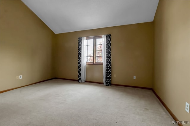 5 Keph Dr Unit 8, Amherst, NY 14228 - spare room featuring light carpet and lofted ceiling