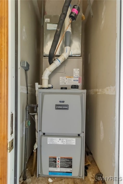 5 Keph Dr Unit 8, Amherst, NY 14228 - utility room featuring heating unit